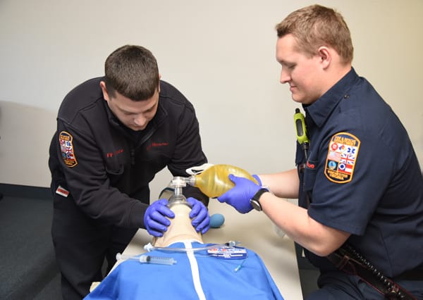 EMTs training for patient resuscitation
