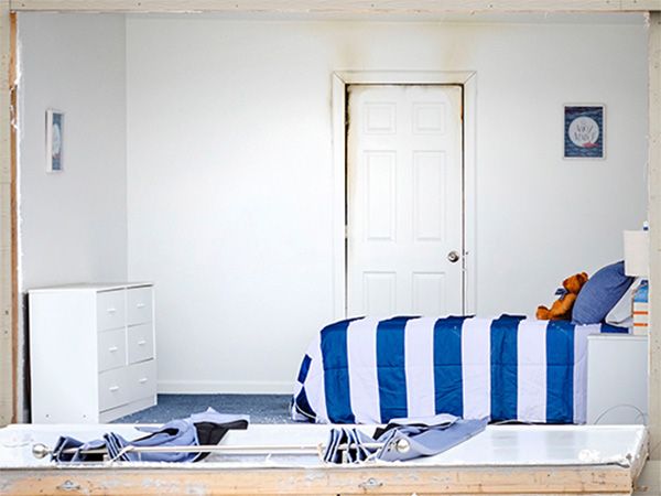 Photo of a bedroom with the door closed