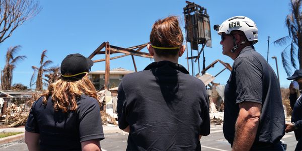 Lahaina, Hawaii (Aug. 17, 2023) - FEMA Associate Administrator for the Office of Response and Recovery Anne Bink surveys damage from the Hawaii Wildfires. 