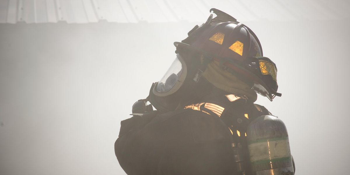 Firefighter using an SCBA